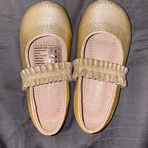 Toddler size seven golden sparkly dress shoes